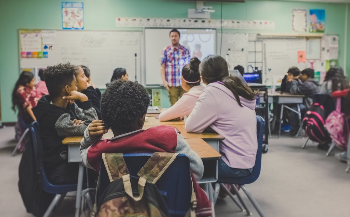 Students learning in a classroom using Next Generation Education Co. international curricula